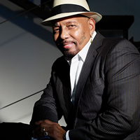 Hire Aaron Neville as 