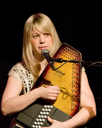 Book Basia Bulat for your next corporate event, function, or private party.