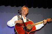 Book Back Home Again Tribute to John Denver for your next corporate event, function, or private party.