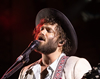 Book Angus Stone for your next event.