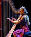 Book Joanna Newsom for your next corporate event, function, or private party.